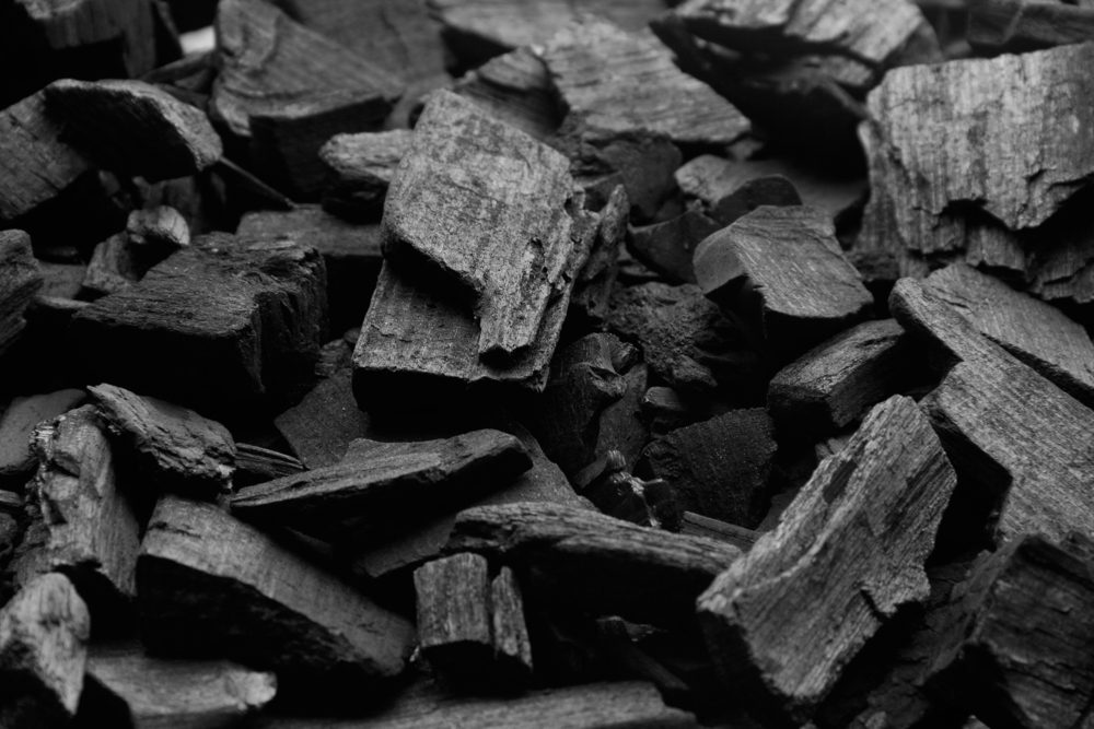 Black charcoal texture background.selective focus