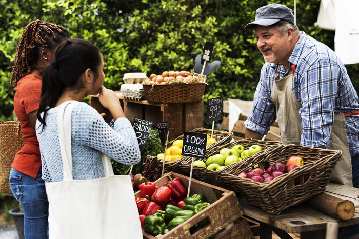 People Buying Fresh Local Vegetable From Farm at Market