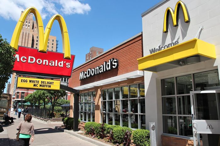 CHICAGO, USA - JUNE 28, 2013: People walk by McDonald's restaurant in Chicago. McDonald's is the 2nd most successful restaurant franchise in the world with 33,000 locations.