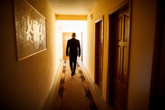 Man goes to the future. Man portrait. Man silhouette. Portrait of business man with black suite. Business. Portrait of a man. Handsome portrait of adult man