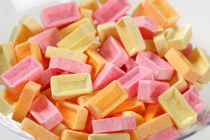Colorful pez candy in a glass cup