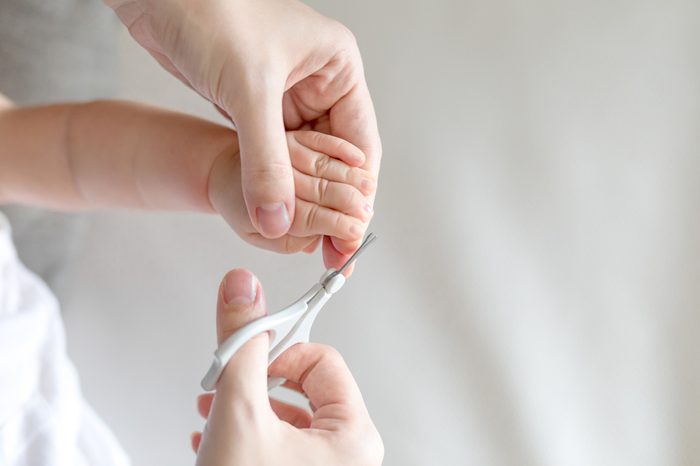 closed up shot of baby nails clipping