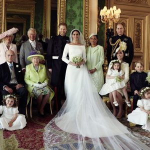 This official wedding royal portrait released by the Duke and Duchess of Sussex, Meghan Markle and Prince Harry, shows - The Duke and Duchess in The Green Drawing Room, Windsor Castle, with (left-to-right): Back row: Master Jasper Dyer, Camilla Duchess of Cornwall, Prince Charles, Ms. Doria Ragland, Prince William ; middle row: Master Brian Mulroney, Prince Philip, Queen Elizabeth II, Catherine Duchess of Cambridge, Princess Charlotte, Prince George, Miss Rylan Litt, Master John Mulroney ; Front row: Miss Ivy Mulroney, Miss Florence van Cutsem, Miss Zalie Warren, Miss Remi Litt.