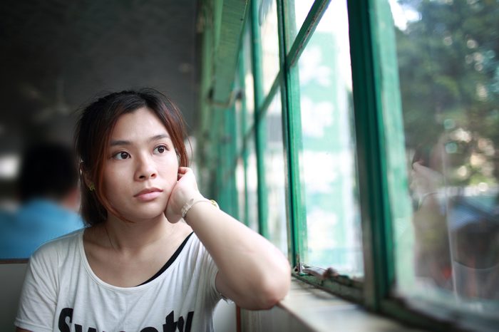 The Thinker, annoying woman waiting someone look at window, staring into space, fall into a trance