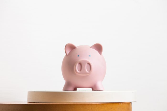 Pink piggy-bank on the table