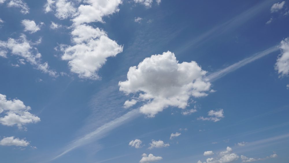 Small cumulus humilis clouds with clearly defined edges.