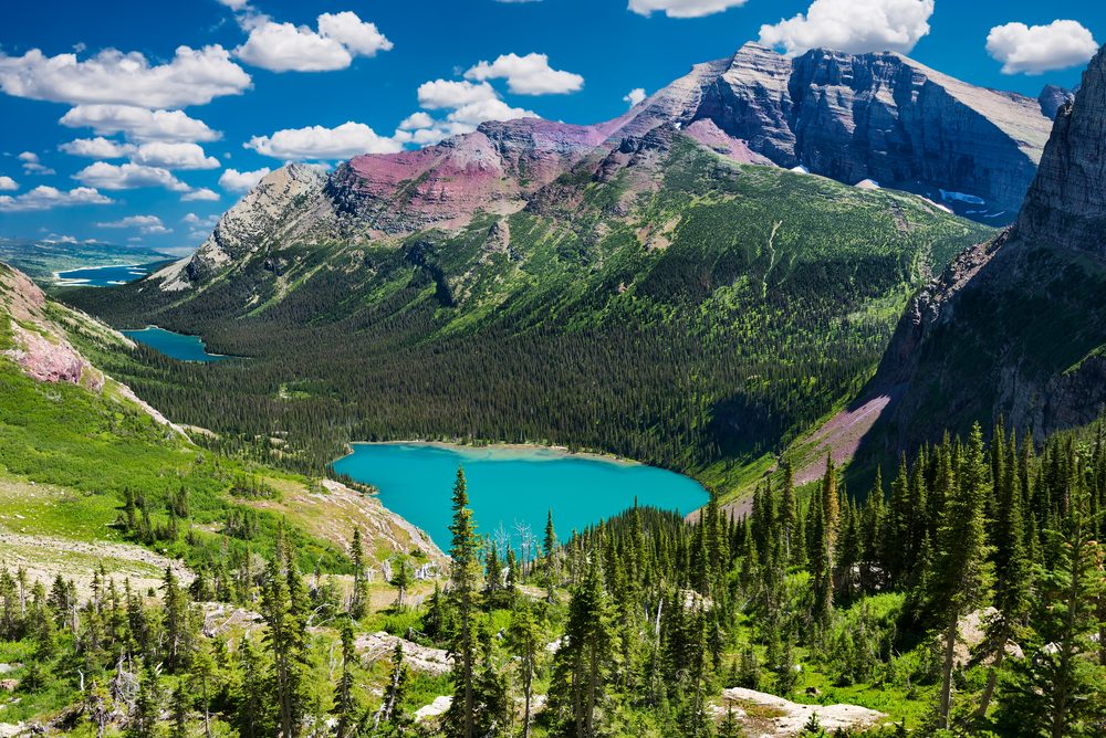 Breathtaking view of a chain of glacial lakes from atop the Grinnell Glacier Trail in Montana