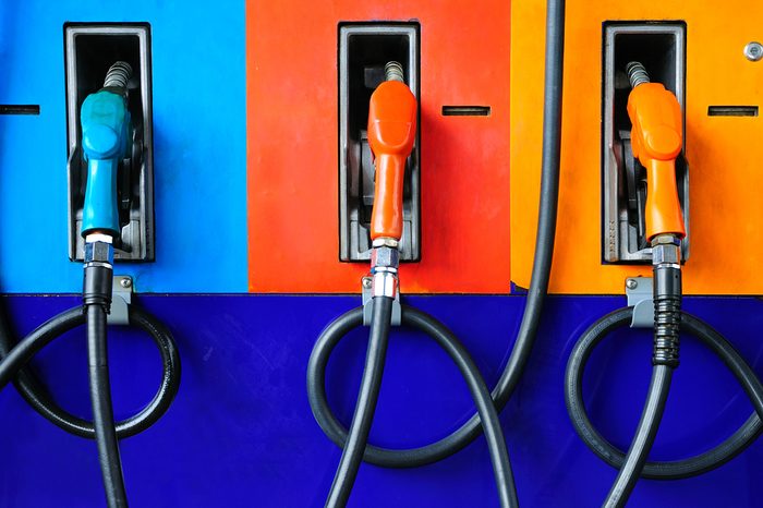 Gas pump nozzles in a service station