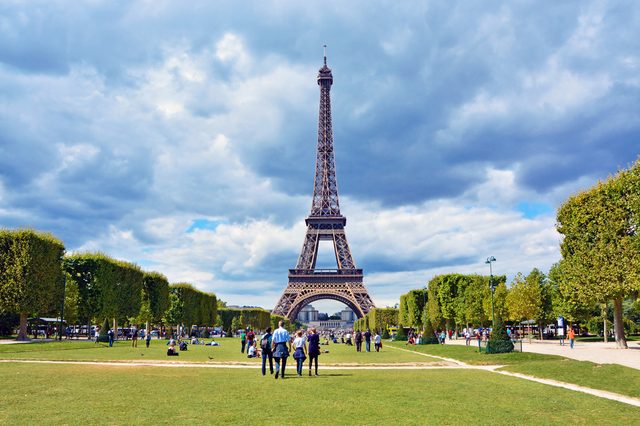 View of Eiffel Tower from Champ de Mars before the storm. Paris, France