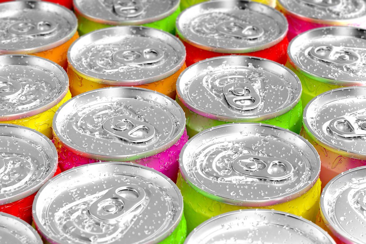 Colorful aluminum cans with water drops.