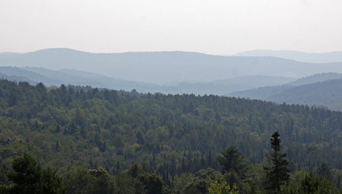 A vista displaying the Green Mountains of Vermont on the horizon.