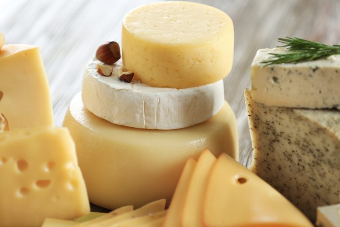 Variety of cheese on table