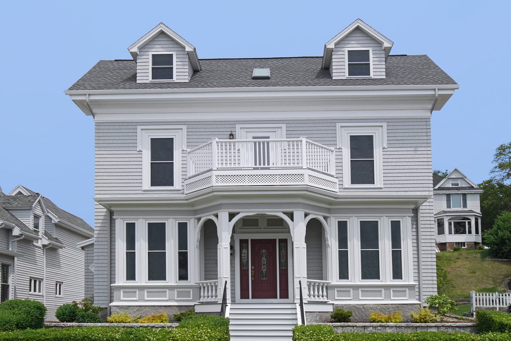 clapboard house with large porch