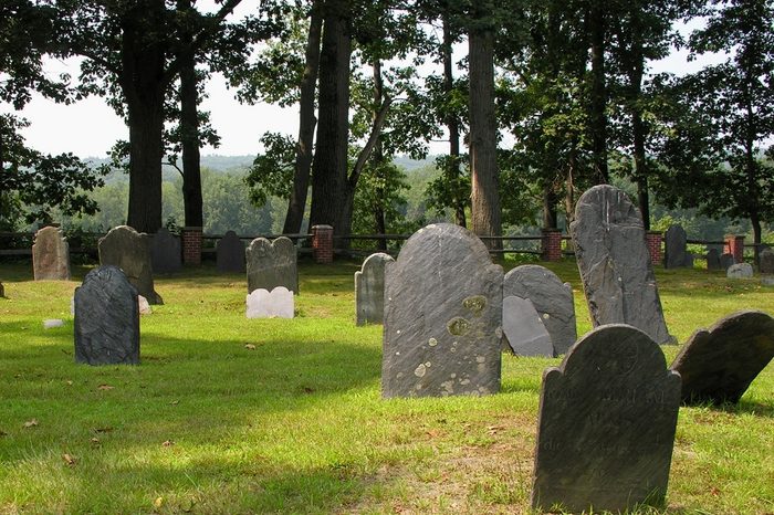 Grave stones facing valley.