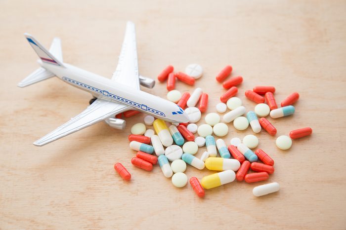 model airplane with multicolored pills from motion sickness clos