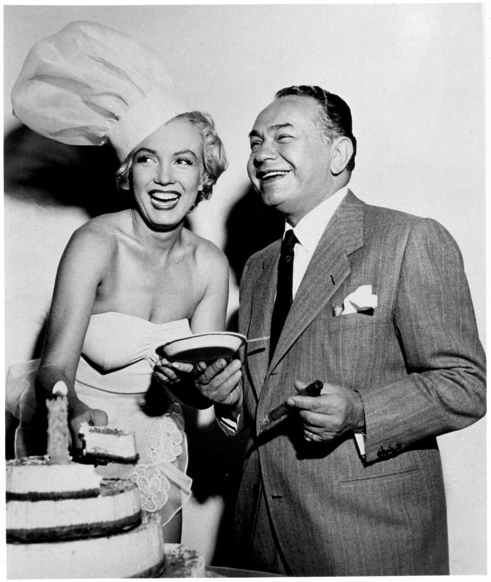 VARIOUS FILM STILLS OF 1951, MARILYN MONROE, EDWARD ROBINSON G, CHEFS HAT, LAUGHING, CLOWNING, FUN, CAKE IN 1951