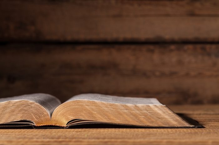 Open bible on desk.