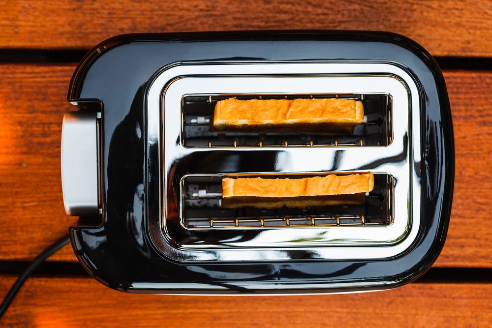 High angle picture of toaster with two sliced bread
