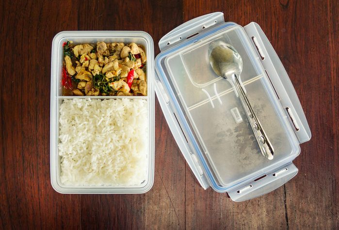 Fried rice with the tupperware box.with steamed rice.