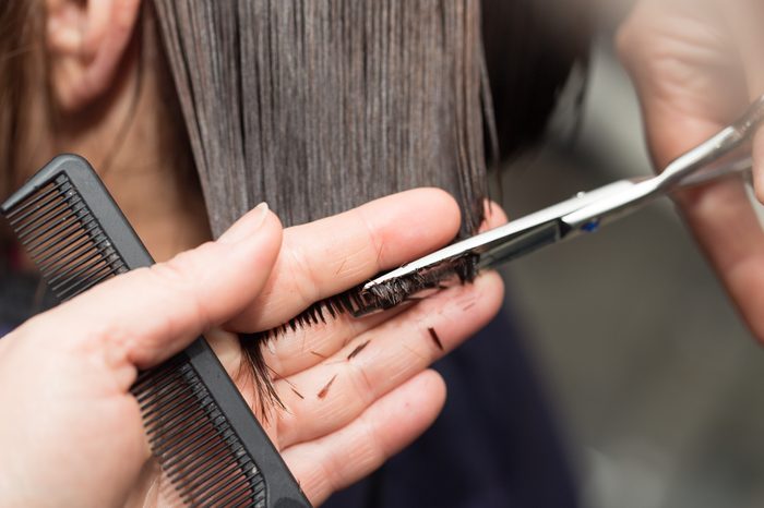 cutting hair in a beauty salon