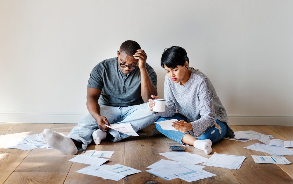 Couple managing the debt