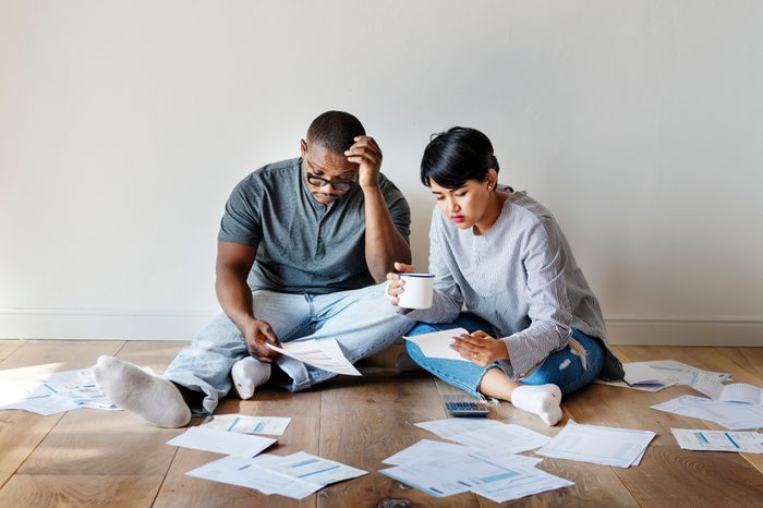 Couple managing the debt