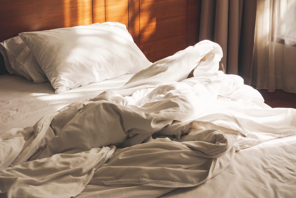 Bed Mattress and Pillows unmade Bedroom Morning with sunlight