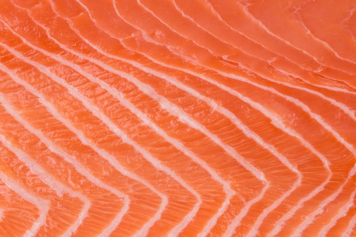 Close up of salmon fillet. Macro. Whole background.