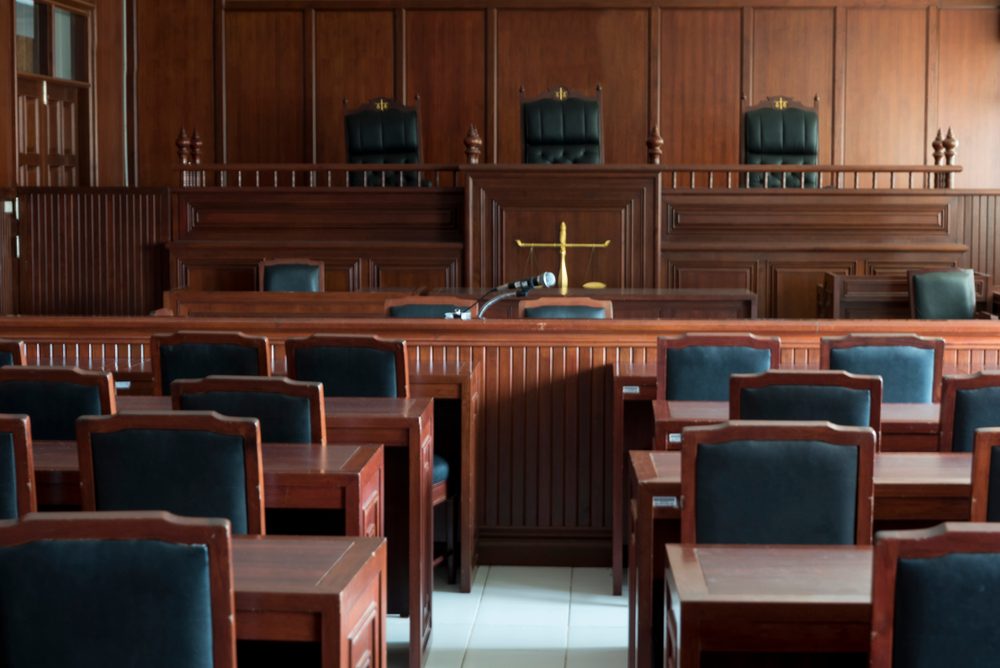 Table and chair in the courtroom of the judiciary.