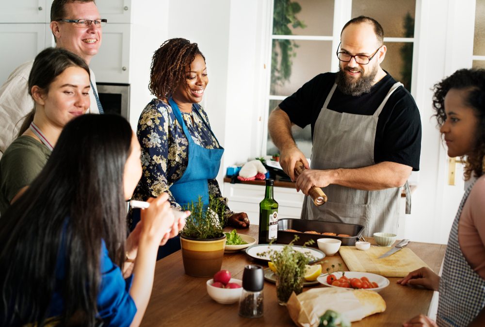 Diverse people joining cooking class