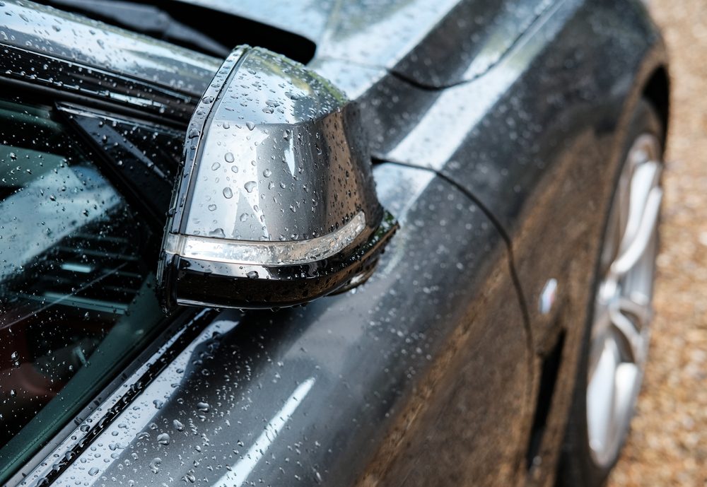 rain washing over car exterior