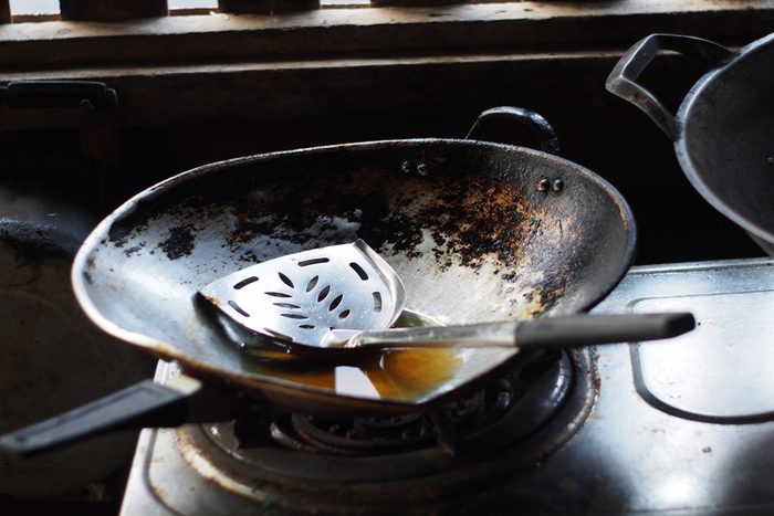 Pan on gas stove/Dirty kitchen