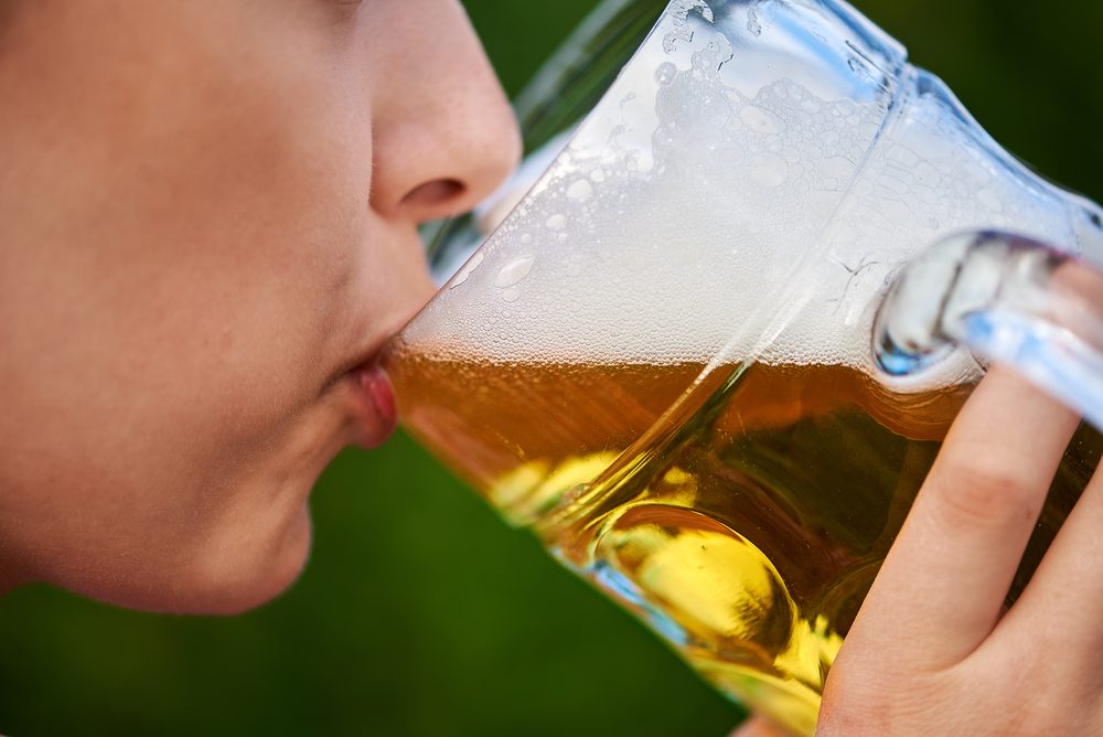 Woman drinking beer