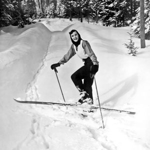 Mandatory Credit: Photo by Underwood Archives/UIG/Shutterstock (3837599a) Lake Of Bays, Ontario, Canada: c. 1956 A young woman turns in the cross country trail and smiles for the camera. VARIOUS