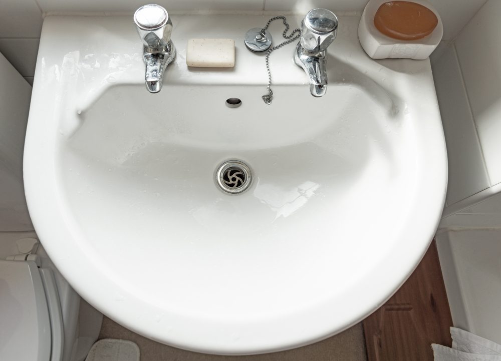 Sink, taps and soap bar from above