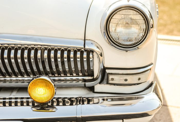 white retro car, with chrome bumper
