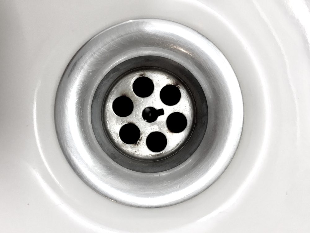 white sink plug hole