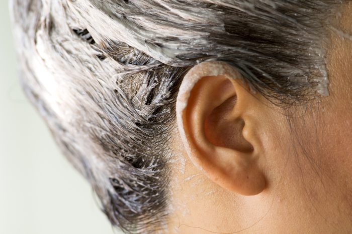 The process of hair coloring,hair coloring,Hair Colouring in process,Woman gets new hair colour,Hair Colouring in process