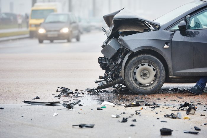 car crash accident on street, damaged automobiles after collision in city