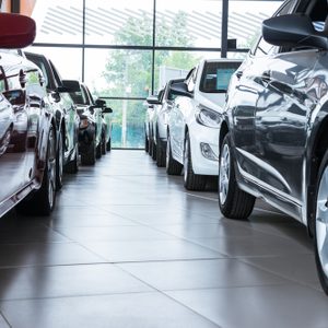 Modern beautiful showroom with cars being sold