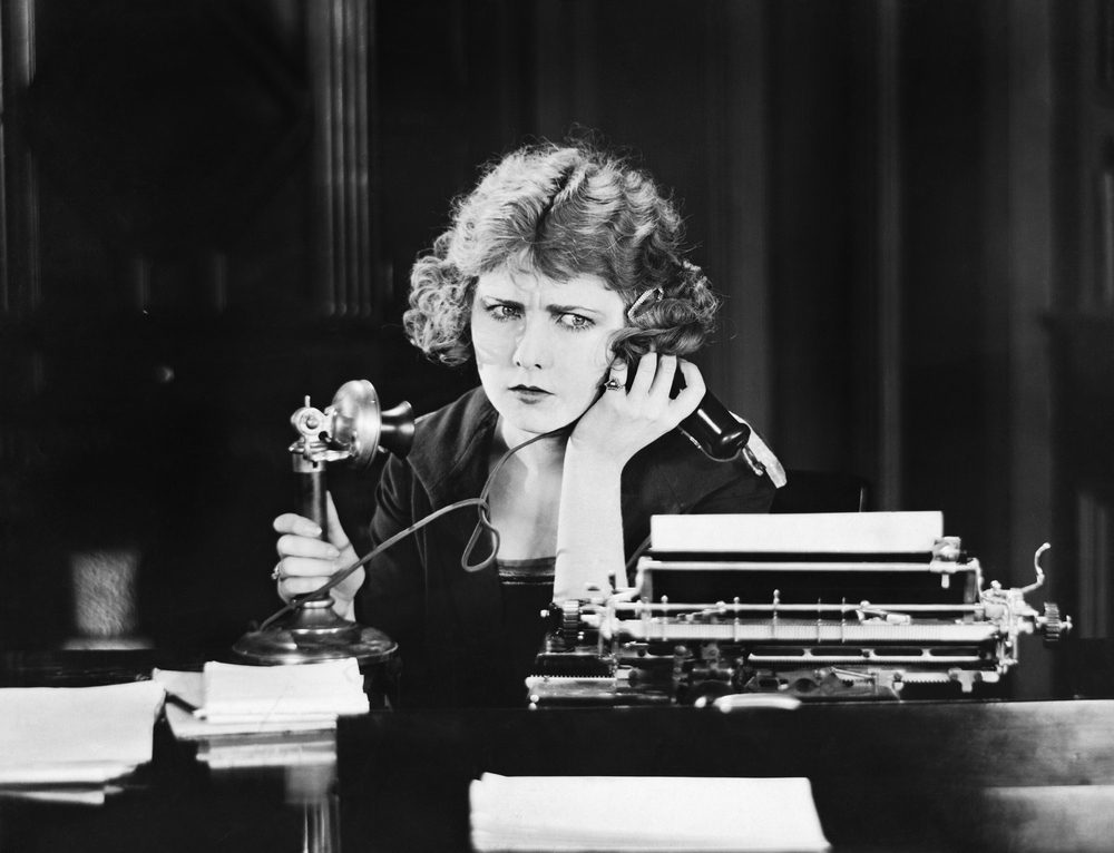 Confused woman on telephone