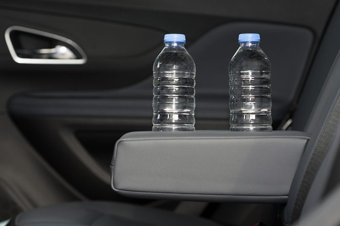 cup holder for water bottle, Modern Car Interior Top View. Black Leather Brand New Car Interior