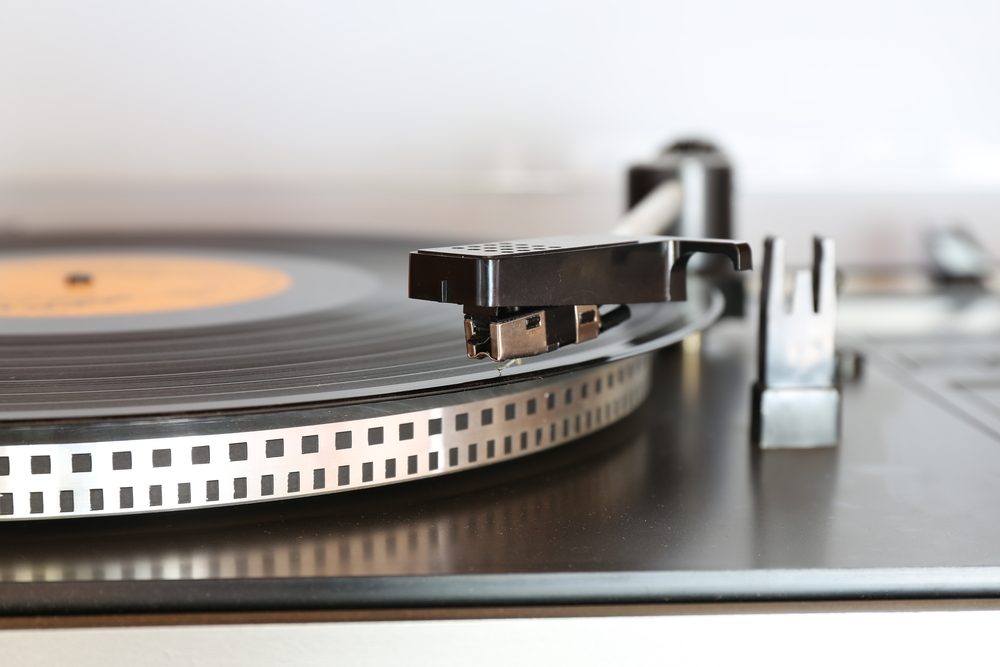 Old gramophone turntable with disc