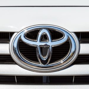 CHIANGRAI, THAILAND - DECEMBER 31, 2014 : Logo of Toyota car on display at Chiang Rai ASEAN flower festival 2014