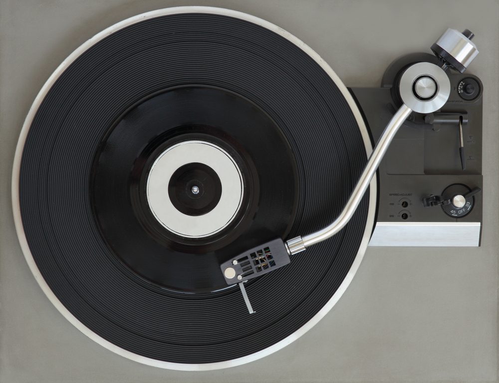 Vintage record player with vinyl record.