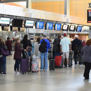 Raleigh, NC/United States- 11/12/2018: Passengers wait to check bags in a long line at RDU International airport.