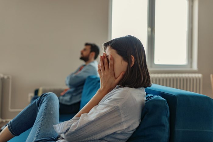 Unhappy Couple After an Argument in the Living Room at Home