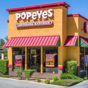 PALMDALE, CA/USA - APRIL 23, 2016: Popeyes Louisiana Kitchen exterior. Popeyes Louisiana Kitchen is an American chain of fried chicken fast food restaurants.