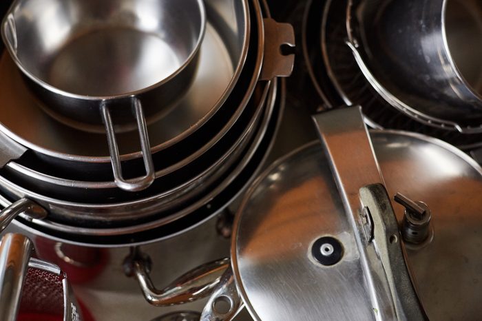 steel pots in a drawer