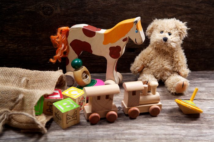 Vintage toys on wooden background